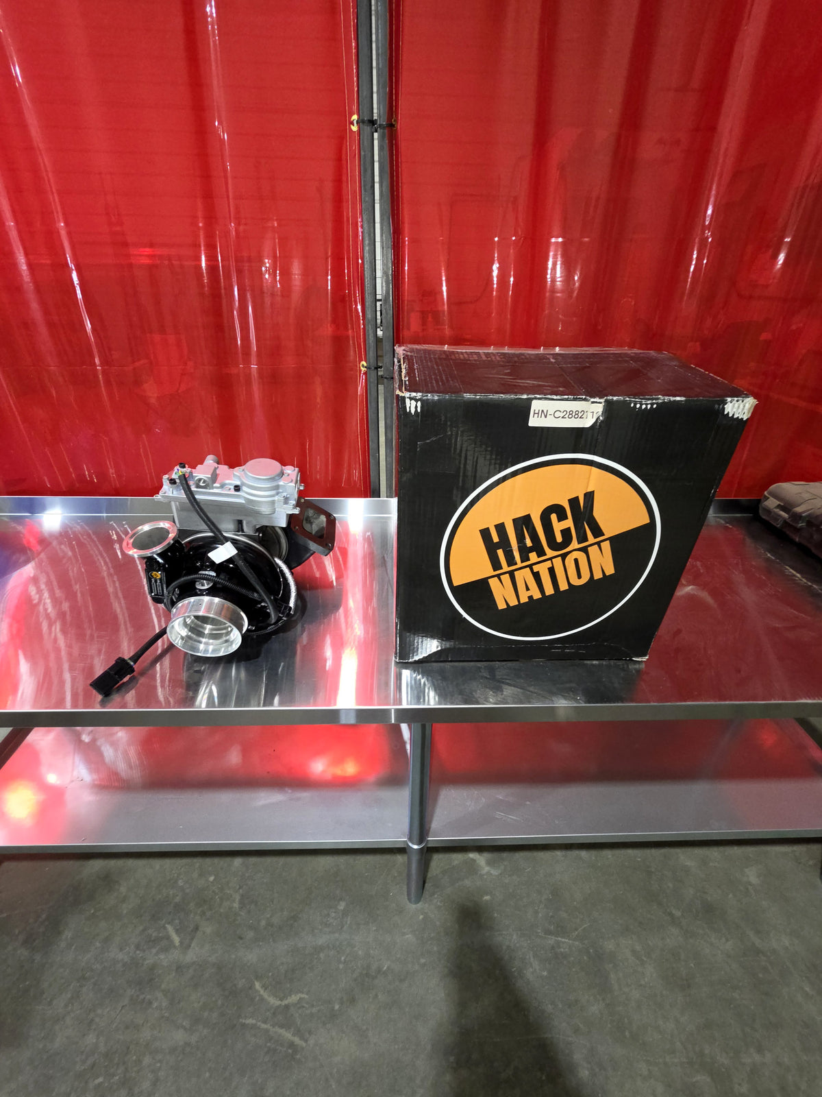 Hack Nation ISX-15 Stage 1 Turbo NEW VGT w/ Actuator (HN-C2882112) with labelled Hack Nation box